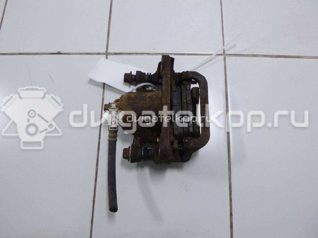 Фото Суппорт тормозной задний правый  44001EM11A для Nissan Tiida / Qashqai / Cube Z12 / Juke F15 / Pulsar C13 {forloop.counter}}