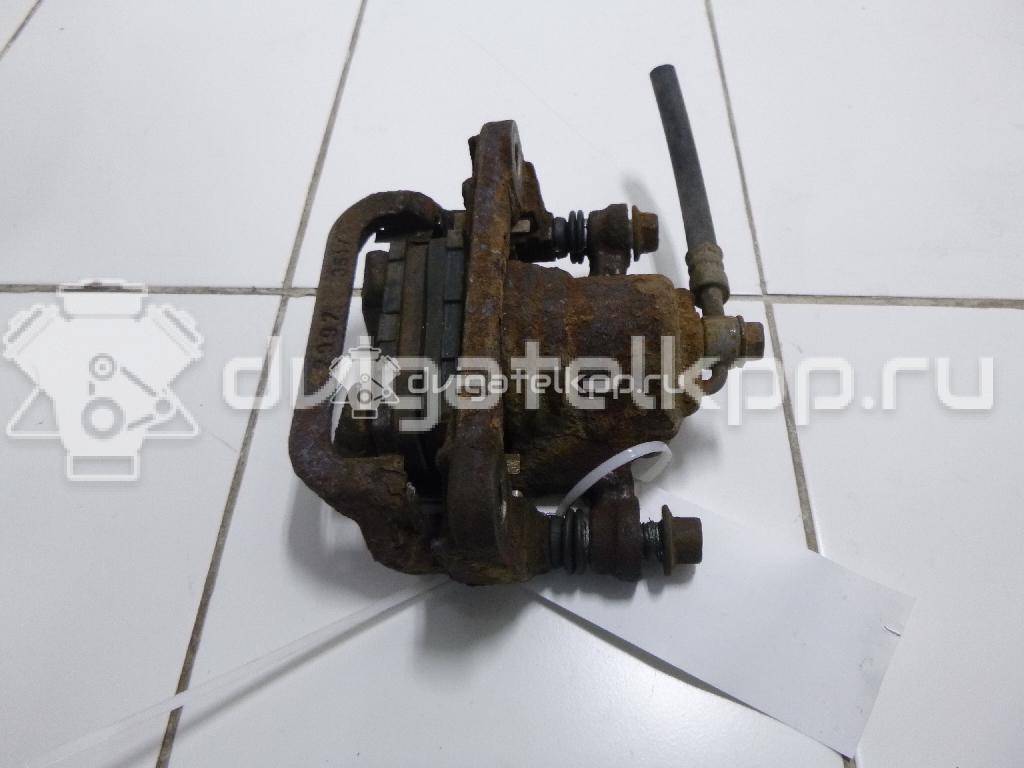 Фото Суппорт тормозной задний правый  44001EM11A для Nissan Tiida / Qashqai / Cube Z12 / Juke F15 / Pulsar C13 {forloop.counter}}