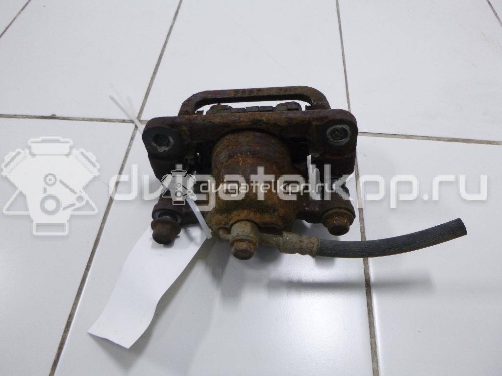 Фото Суппорт тормозной задний правый  44001EM11A для Nissan Tiida / Qashqai / Cube Z12 / Juke F15 / Pulsar C13 {forloop.counter}}