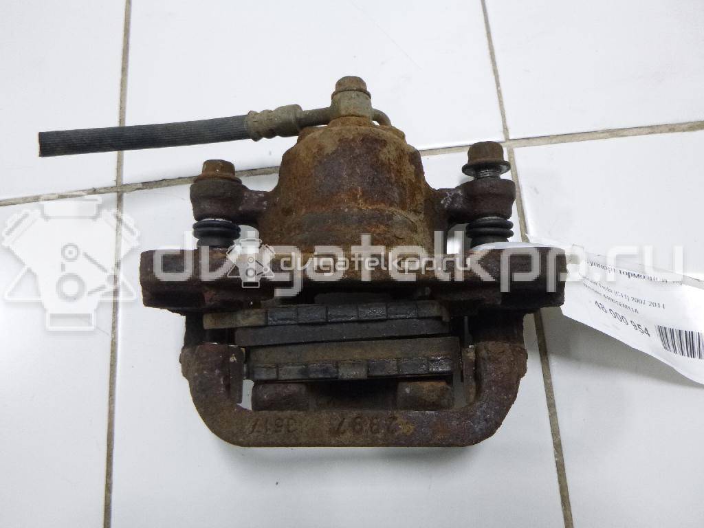Фото Суппорт тормозной задний правый  44001EM11A для Nissan Tiida / Qashqai / Cube Z12 / Juke F15 / Pulsar C13 {forloop.counter}}