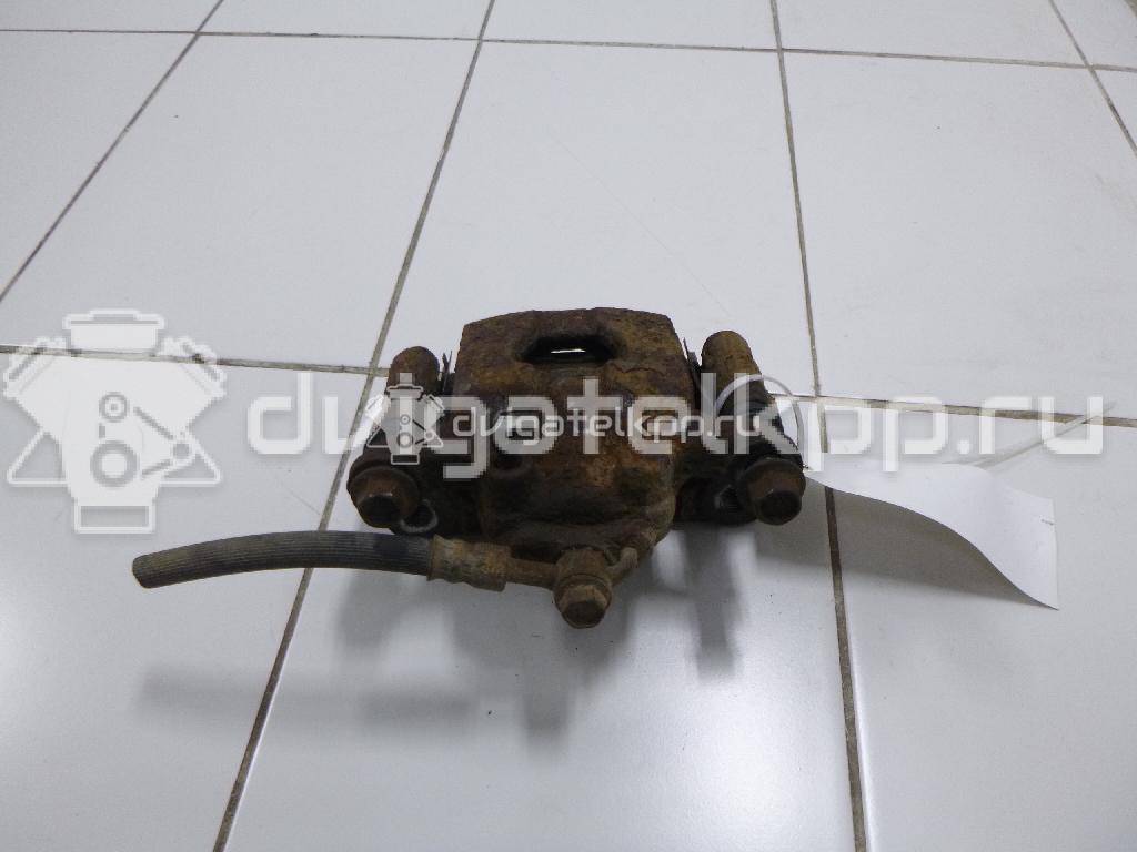 Фото Суппорт тормозной задний правый  44001EM11A для Nissan Tiida / Qashqai / Cube Z12 / Juke F15 / Pulsar C13 {forloop.counter}}
