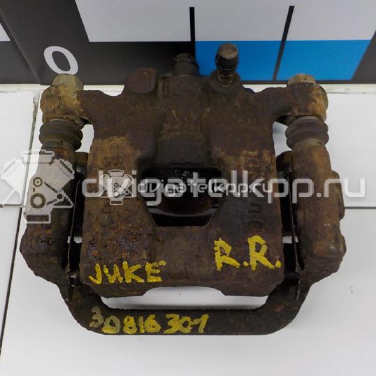 Фото Суппорт тормозной задний правый  440011KD0A для Nissan Tiida / Qashqai / Cube Z12 / Juke F15 / Pulsar C13