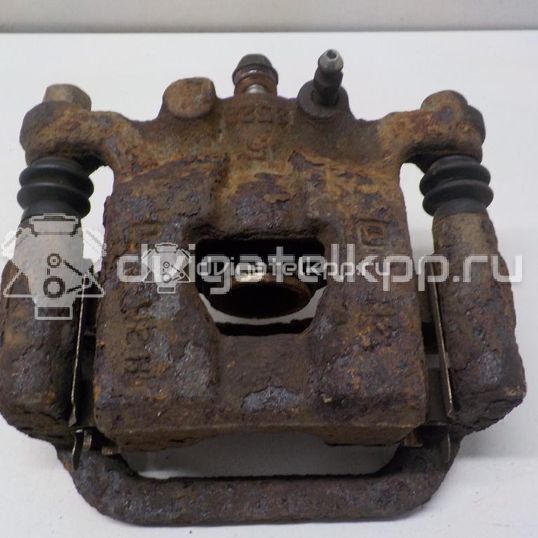 Фото Суппорт тормозной задний правый  440011KD0A для Nissan Tiida / Qashqai / Cube Z12 / Juke F15 / Pulsar C13