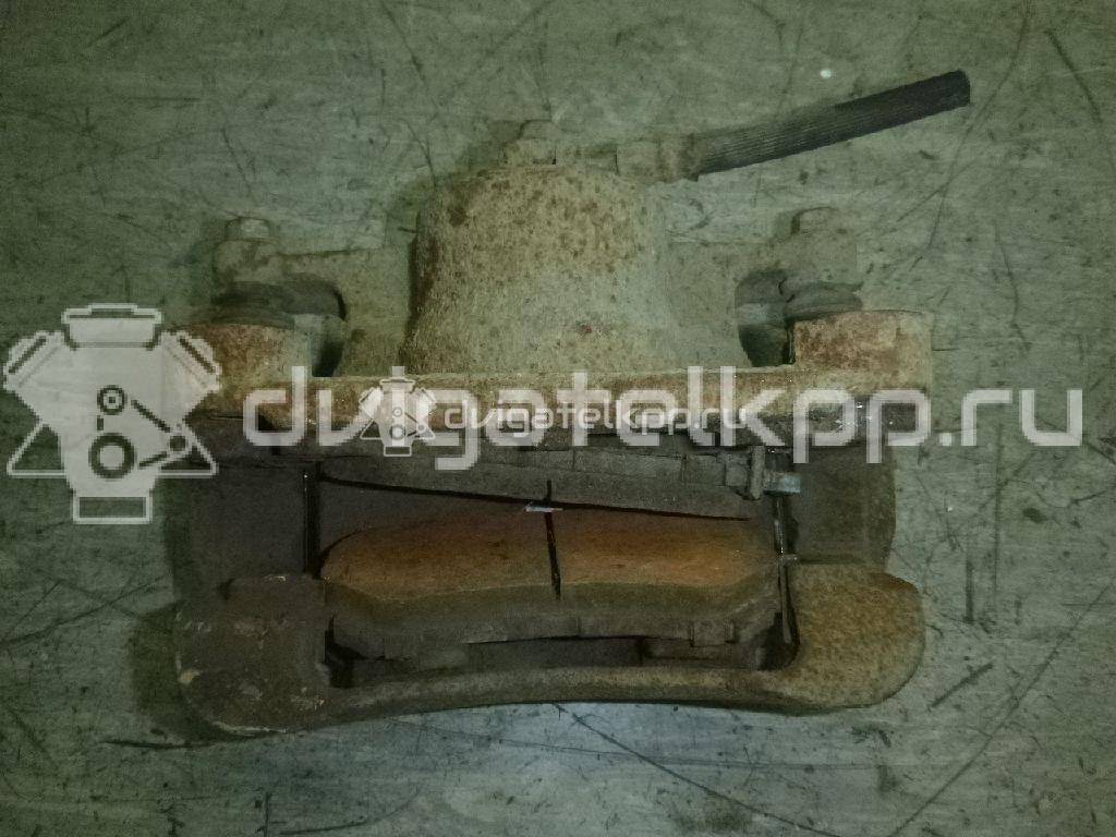 Фото Суппорт тормозной передний правый  41001JD00A для Nissan Qashqai / X-Trail {forloop.counter}}