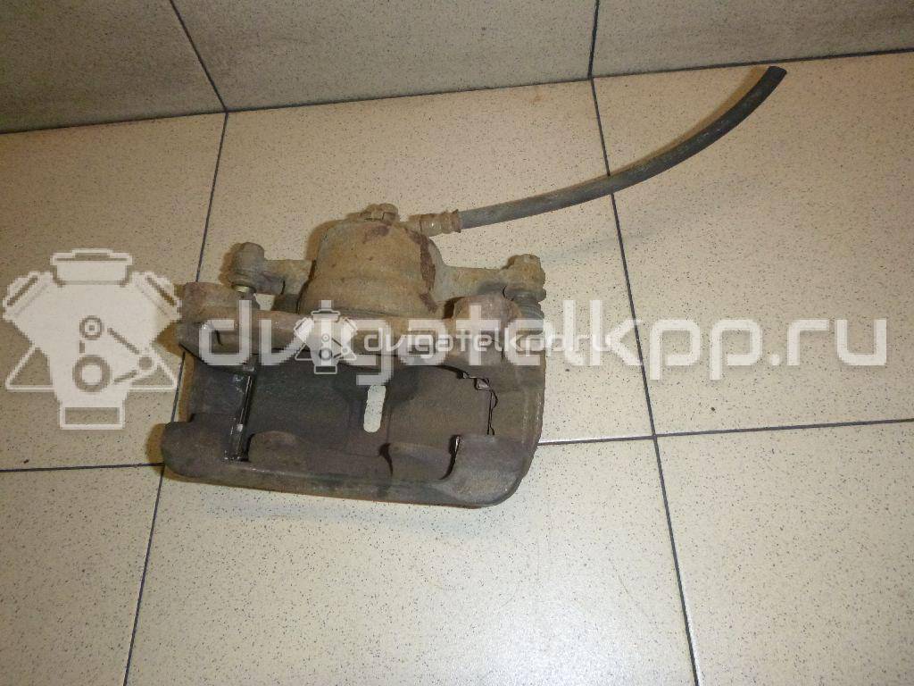 Фото Суппорт тормозной передний правый  41001JD00A для Nissan Qashqai / X-Trail {forloop.counter}}