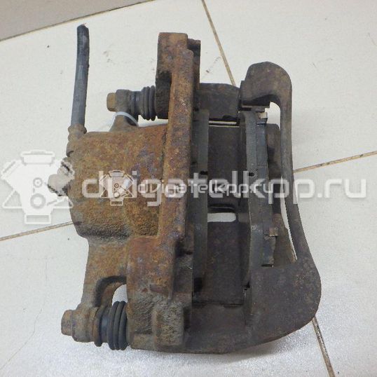 Фото Суппорт тормозной передний правый  41001JD00A для Nissan Qashqai / X-Trail