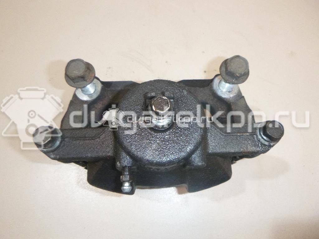 Фото Суппорт тормозной передний правый  410014EA0A для Nissan Qashqai {forloop.counter}}