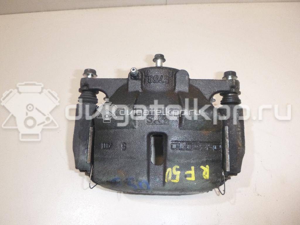 Фото Суппорт тормозной передний правый  410014EA0A для Nissan Qashqai {forloop.counter}}