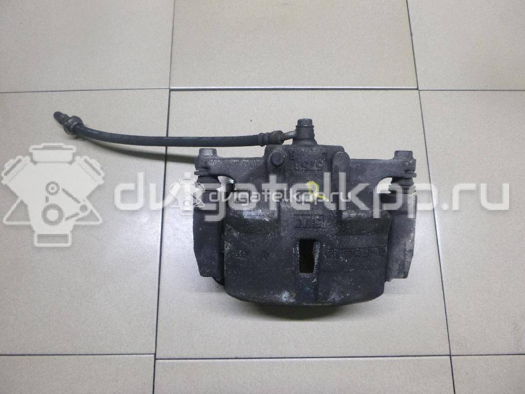 Фото Суппорт тормозной передний правый  410014EA0A для Nissan Qashqai {forloop.counter}}