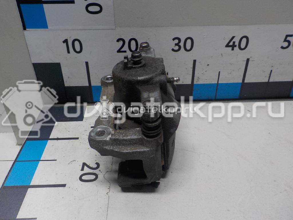Фото Суппорт тормозной передний правый  410014EA0A для Nissan Qashqai {forloop.counter}}