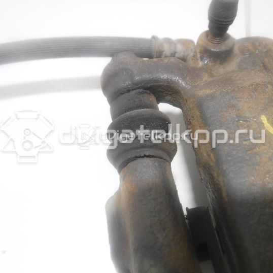 Фото Суппорт тормозной задний левый  44011JY00A для Nissan Qashqai