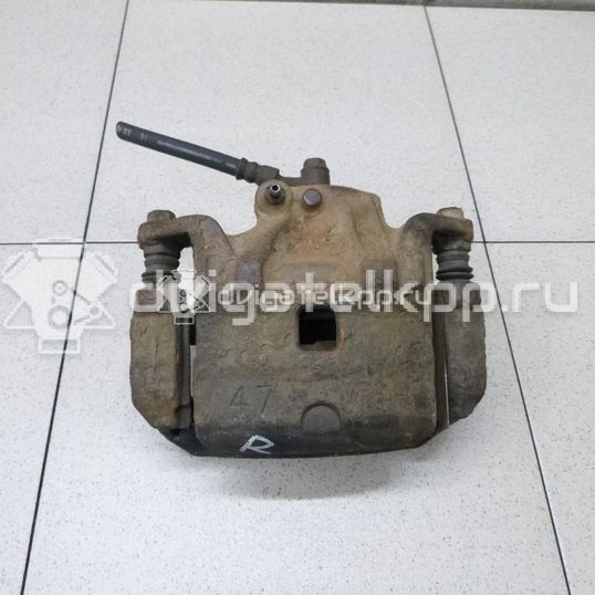 Фото Суппорт тормозной передний правый  41001EM10A для Nissan Tiida / Cube Z12
