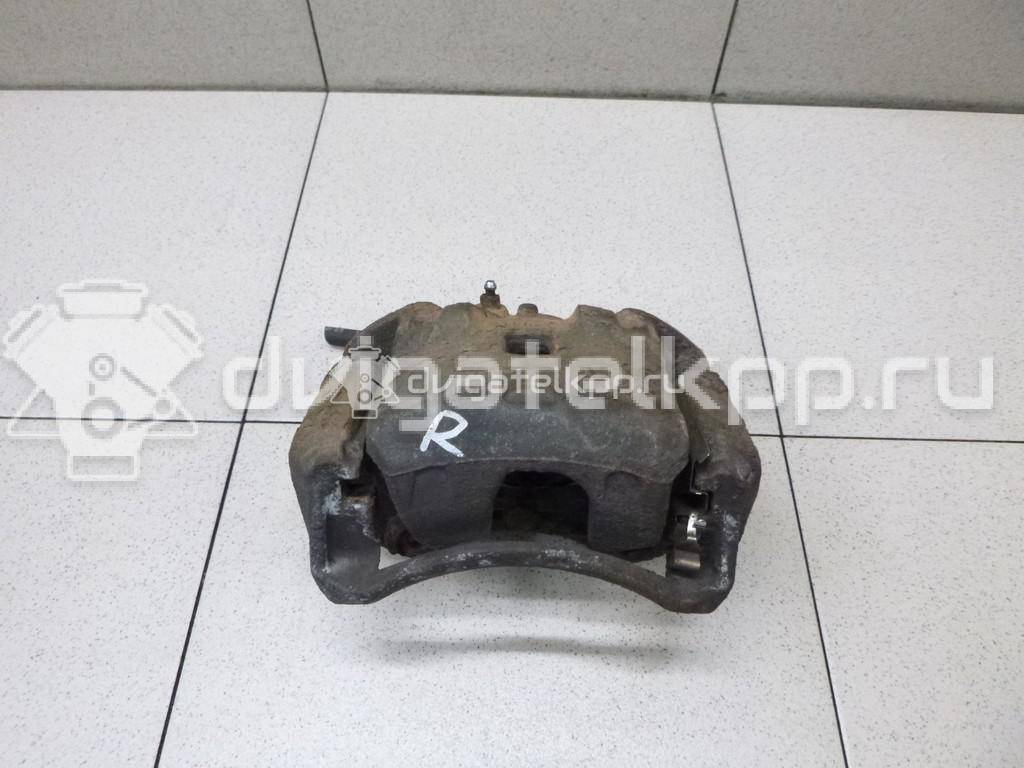 Фото Суппорт тормозной передний правый  41001EM10A для Nissan Tiida / Cube Z12 {forloop.counter}}