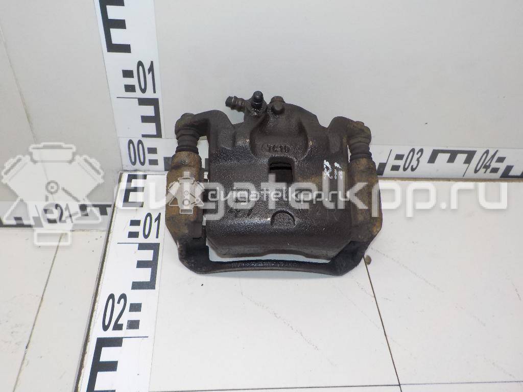 Фото Суппорт тормозной передний правый  41001EM10A для Nissan Tiida / Cube Z12 {forloop.counter}}