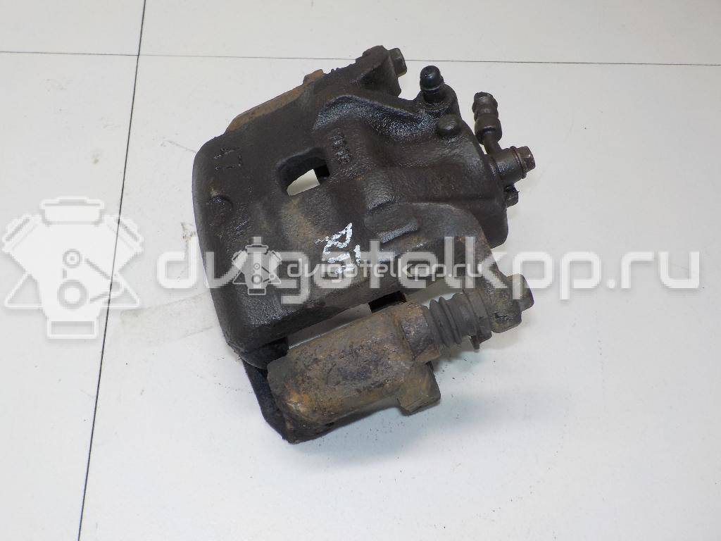 Фото Суппорт тормозной передний правый  41001EM10A для Nissan Tiida / Cube Z12 {forloop.counter}}