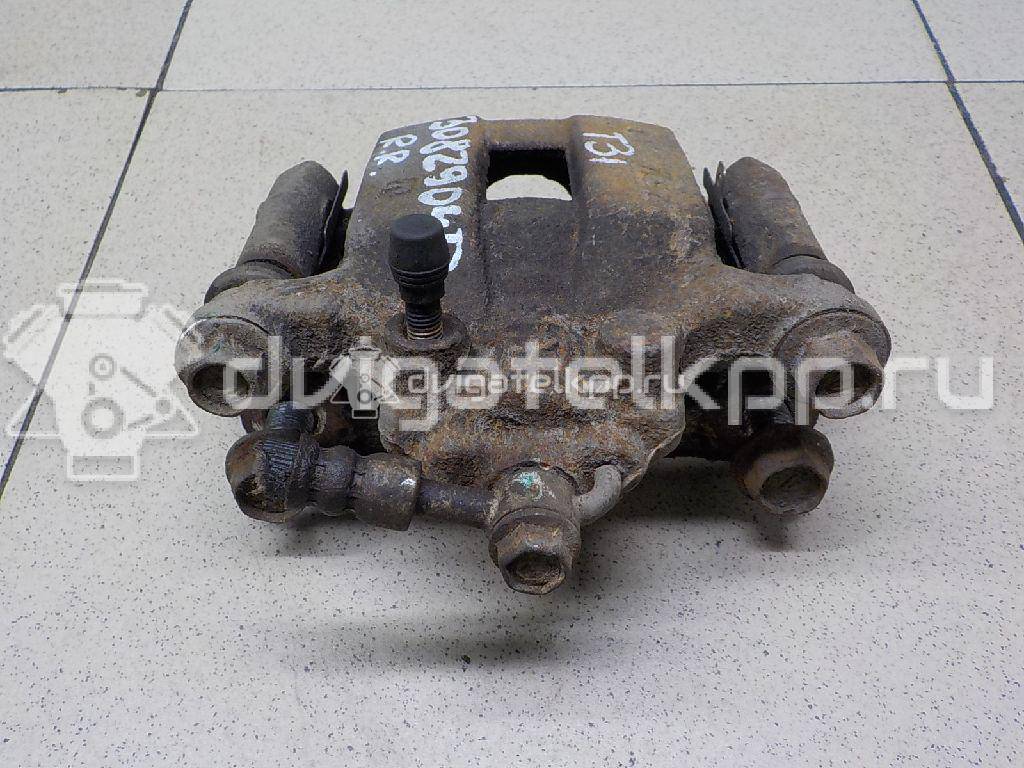 Фото Суппорт тормозной задний правый  44001JG00A для Nissan X-Trail {forloop.counter}}