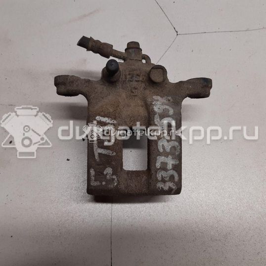 Фото Суппорт тормозной задний левый  44011JG00A для Nissan X-Trail