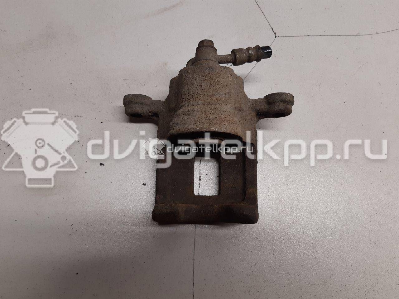 Фото Суппорт тормозной задний левый  44011JG00A для Nissan X-Trail {forloop.counter}}