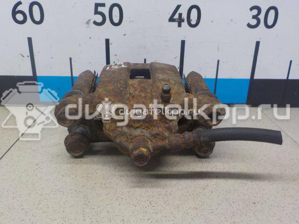 Фото Суппорт тормозной задний левый  44011JG00A для Nissan X-Trail {forloop.counter}}