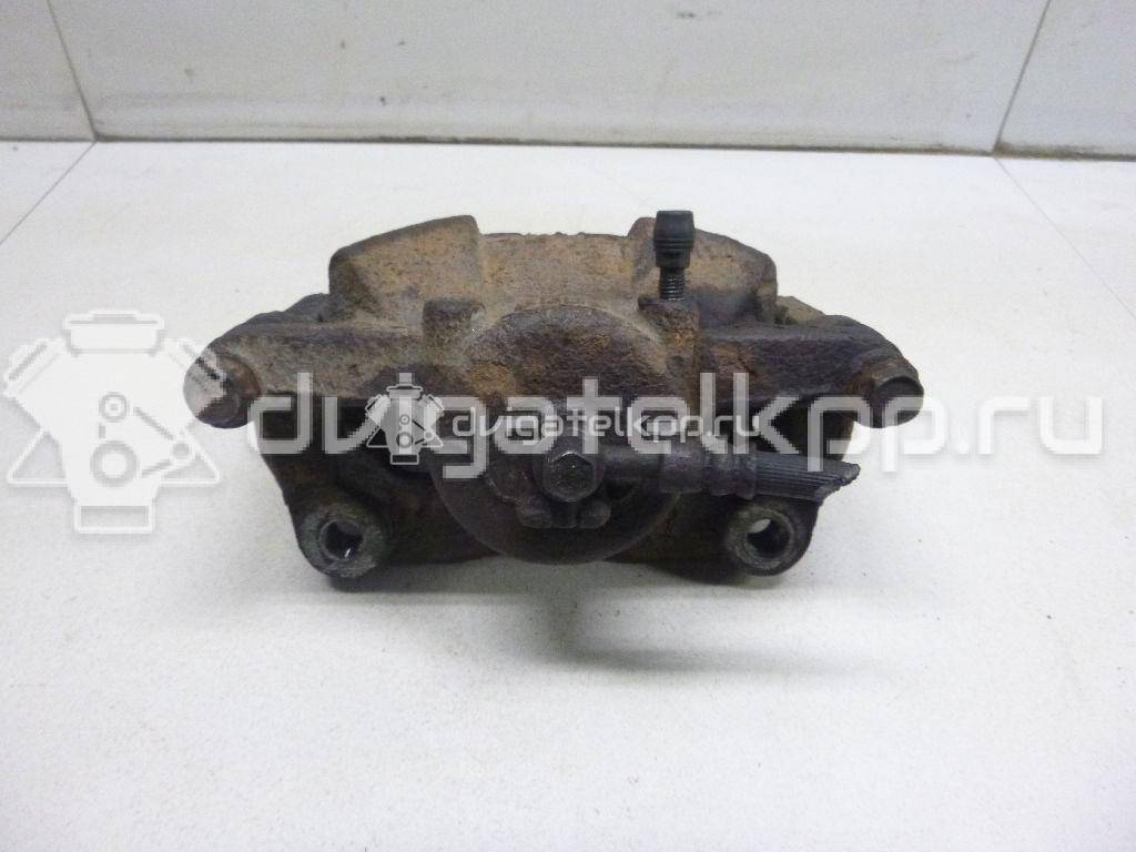 Фото Суппорт тормозной передний правый  41001JD00A для Nissan Qashqai / X-Trail {forloop.counter}}