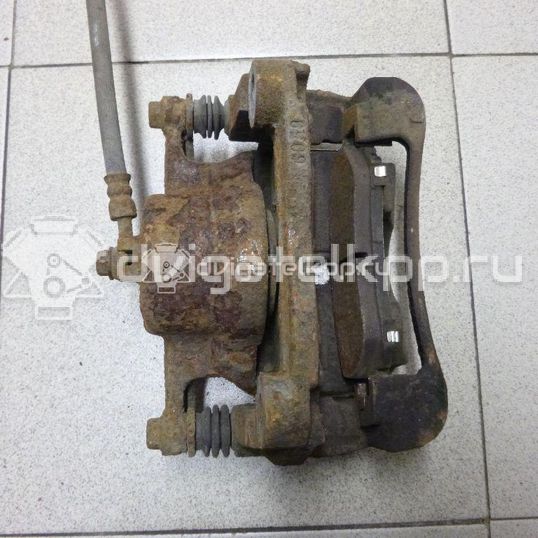 Фото Суппорт тормозной передний правый  41001JD00A для Nissan Qashqai / X-Trail