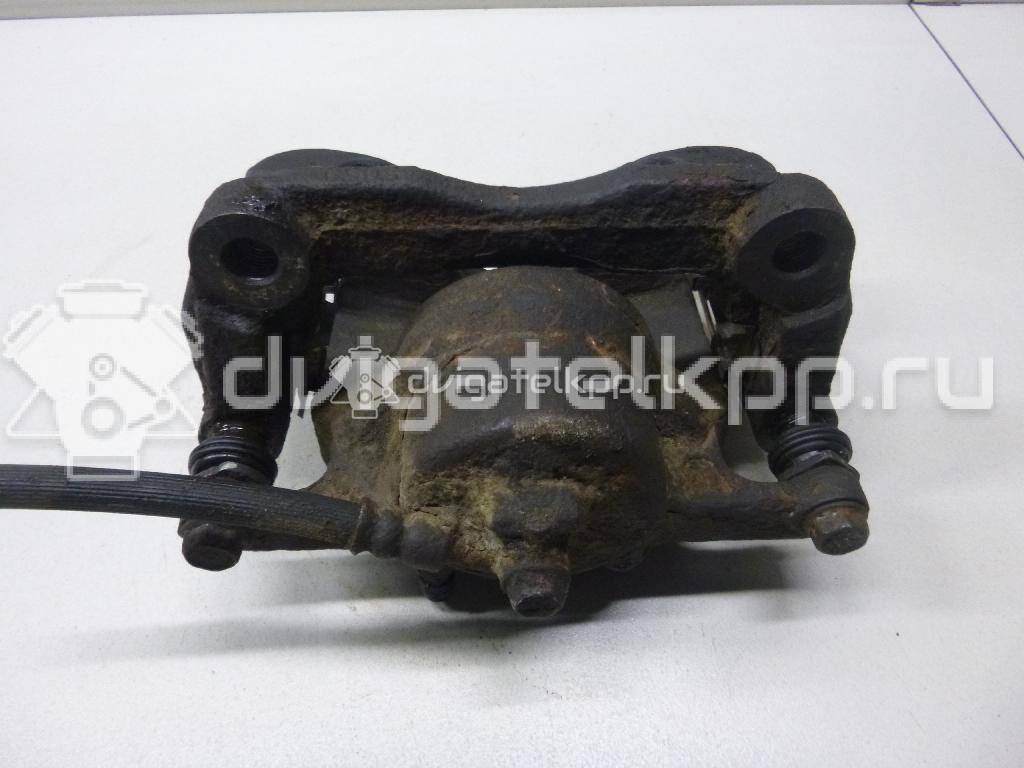 Фото Суппорт тормозной передний правый  41001JD00A для Nissan Qashqai / X-Trail {forloop.counter}}