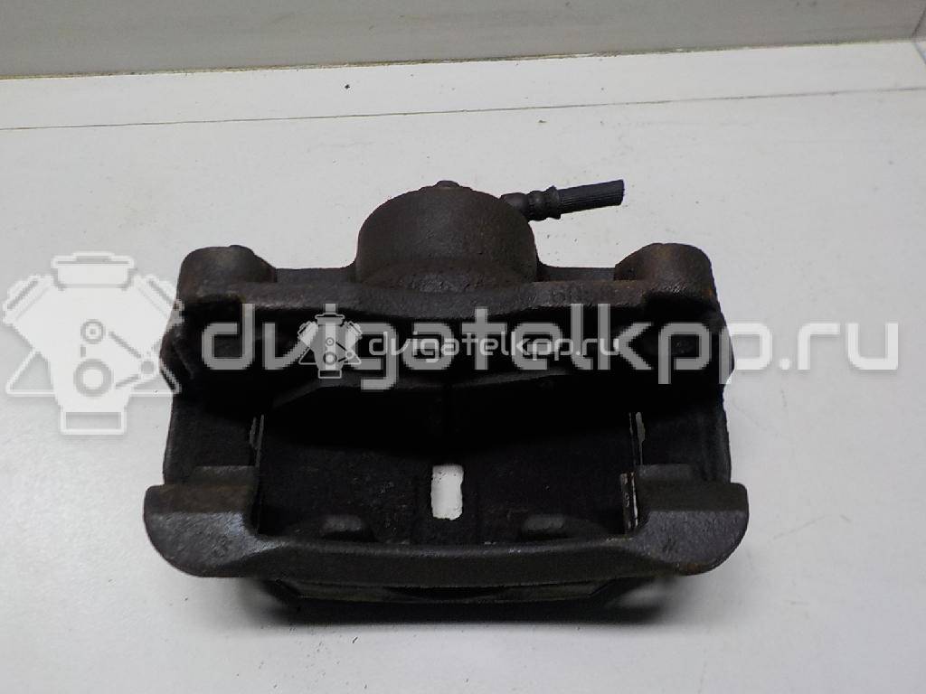 Фото Суппорт тормозной передний правый  41001JD00A для Nissan Qashqai / X-Trail {forloop.counter}}
