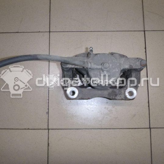 Фото Суппорт тормозной передний левый  410114BA0A для Nissan Qashqai / X-Trail