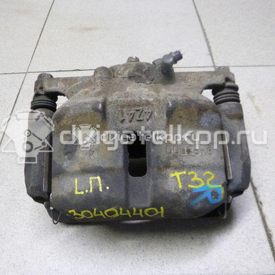 Фото Суппорт тормозной передний левый  410114BA0A для Nissan Qashqai / X-Trail
