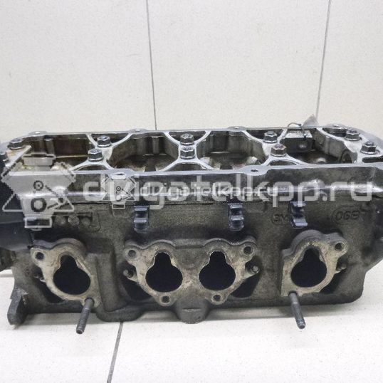 Фото Головка блока для двигателя BSE для Audi A3 102 л.с 8V 1.6 л бензин 06B103351F