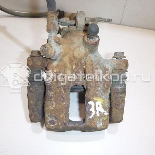 Фото Суппорт тормозной задний правый  44001BM40A для Nissan Primera / Almera