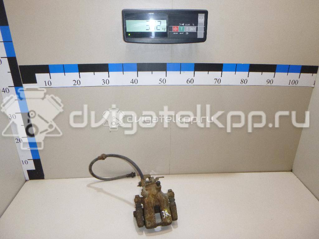 Фото Суппорт тормозной задний правый  44001BM40A для Nissan Primera / Almera {forloop.counter}}