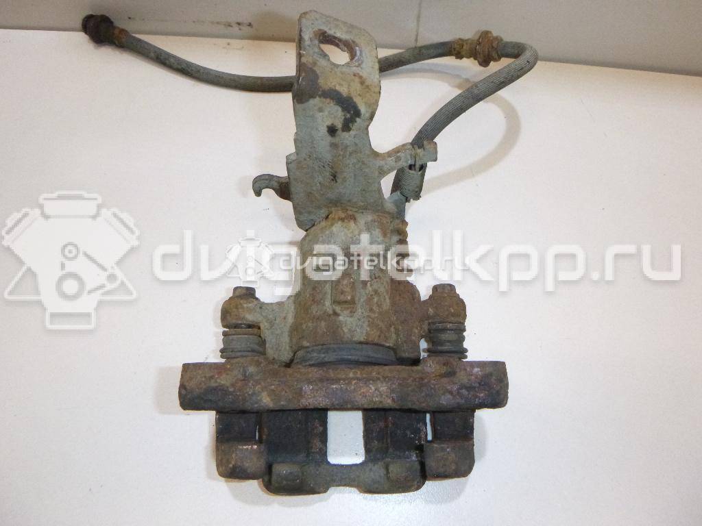 Фото Суппорт тормозной задний правый  44001BM40A для Nissan Primera / Almera {forloop.counter}}