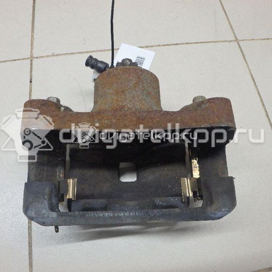 Фото Суппорт тормозной передний левый  41011ET00A для Nissan Juke F15