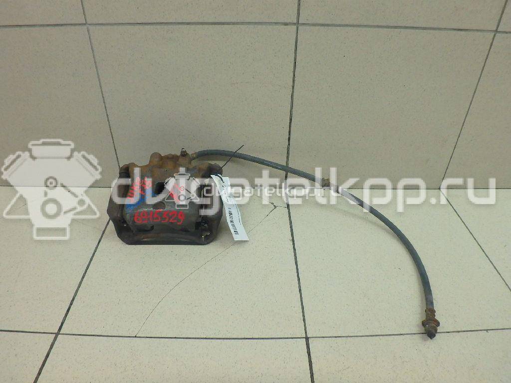 Фото Суппорт тормозной передний левый  41011ET00A для Nissan Juke F15 {forloop.counter}}