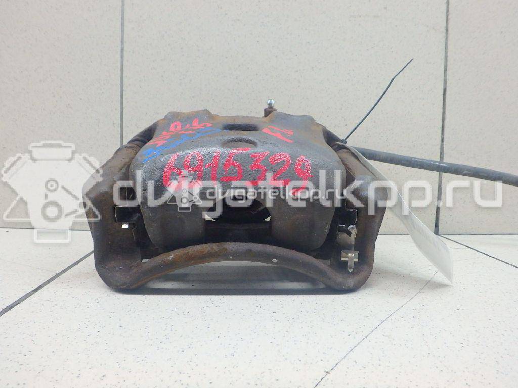 Фото Суппорт тормозной передний левый  41011ET00A для Nissan Juke F15 {forloop.counter}}