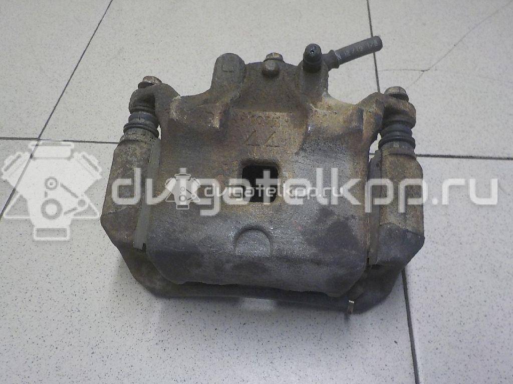Фото Суппорт тормозной передний левый  41011ET00A для Nissan Juke F15 {forloop.counter}}