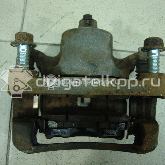 Фото Суппорт тормозной передний левый  41011ET00A для Nissan Juke F15