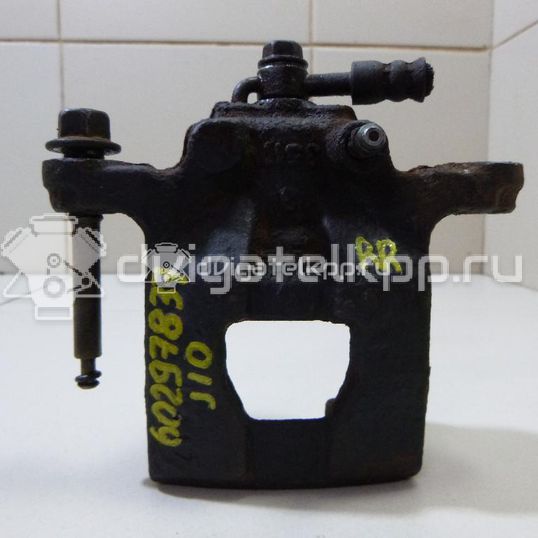 Фото Суппорт тормозной задний правый  44001EM11A для Nissan Tiida / Qashqai / Cube Z12 / Juke F15 / Pulsar C13