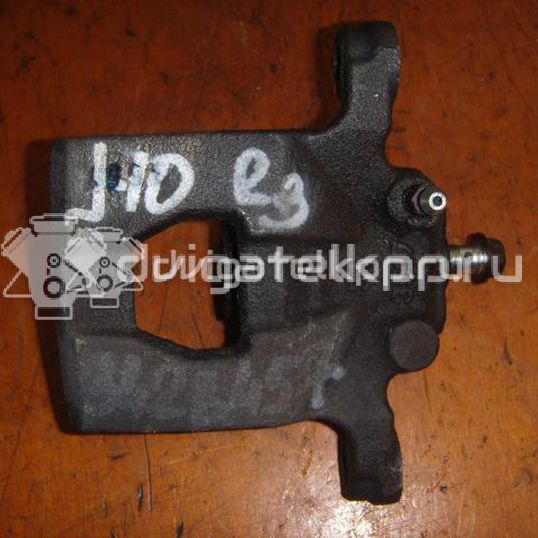 Фото Суппорт тормозной задний правый  44001EM11A для Nissan Tiida / Qashqai / Cube Z12 / Juke F15 / Pulsar C13