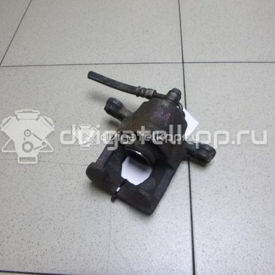Фото Суппорт тормозной задний правый  44001EM11A для Nissan Tiida / Qashqai / Cube Z12 / Juke F15 / Pulsar C13