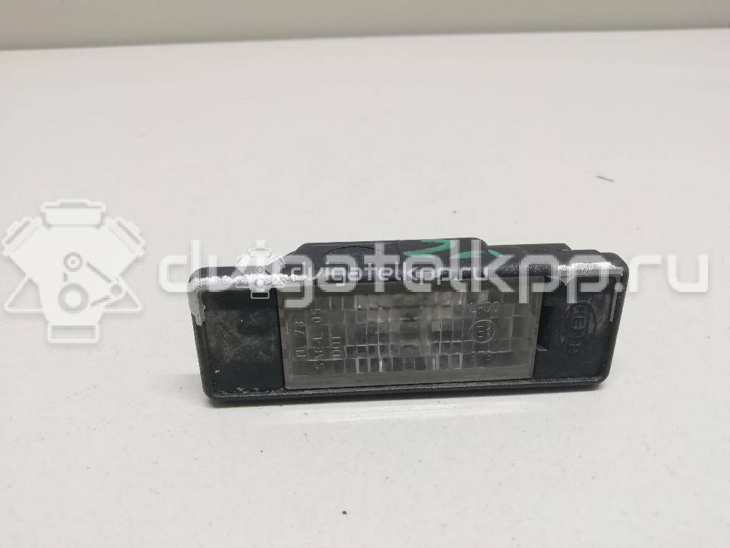 Фото Фонарь подсветки номера  26510AU300 для Nissan Primera / Micra / Note / Nv200 / Np300 {forloop.counter}}