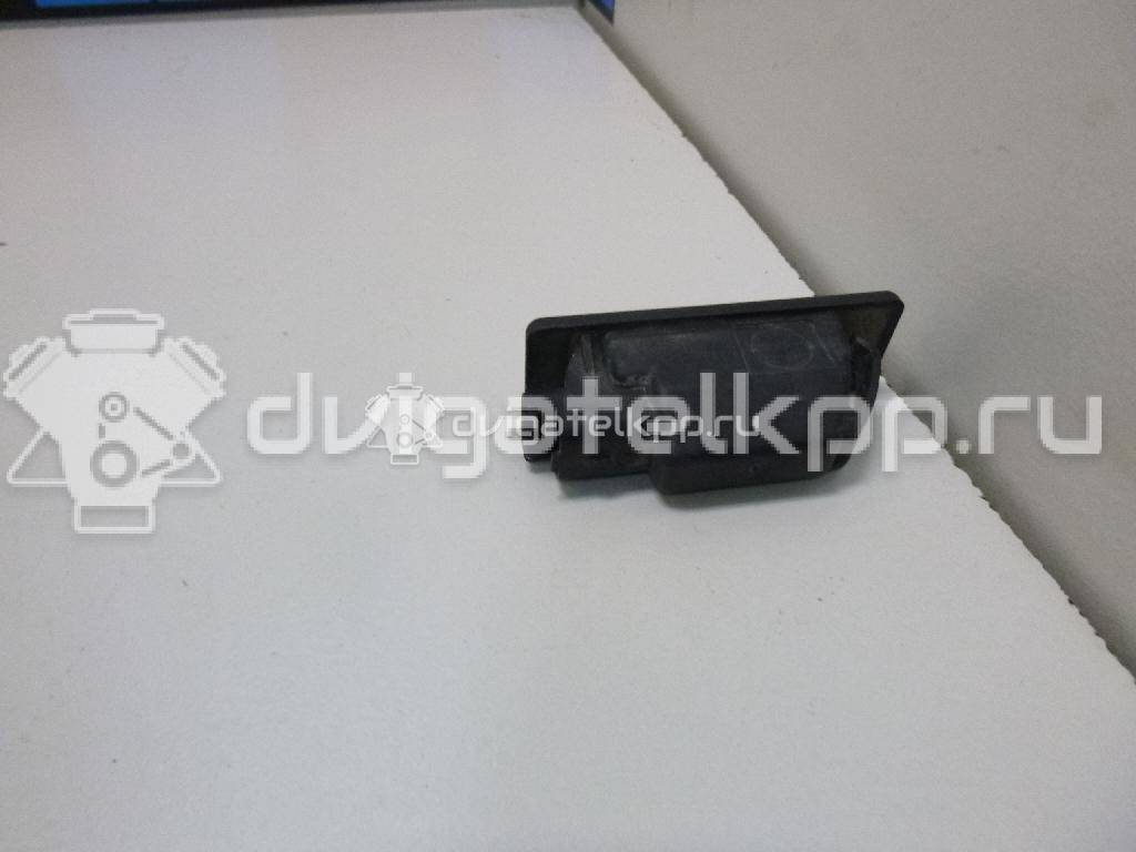 Фото Фонарь подсветки номера  26510AU300 для Nissan Primera / Micra / Note / Nv200 / Np300 {forloop.counter}}