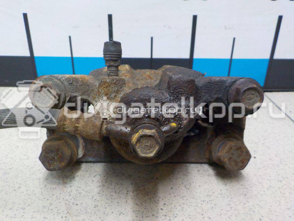 Фото Суппорт тормозной задний правый  44001EM11A для Nissan Tiida / Qashqai / Cube Z12 / Juke F15 / Pulsar C13 {forloop.counter}}