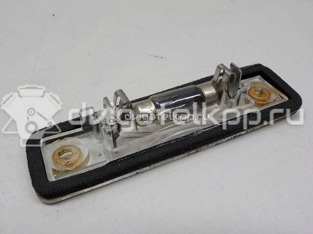 Фото Фонарь подсветки номера  1224143 для Opel Tigra / Astra / Corsa / Vectra / Combo {forloop.counter}}