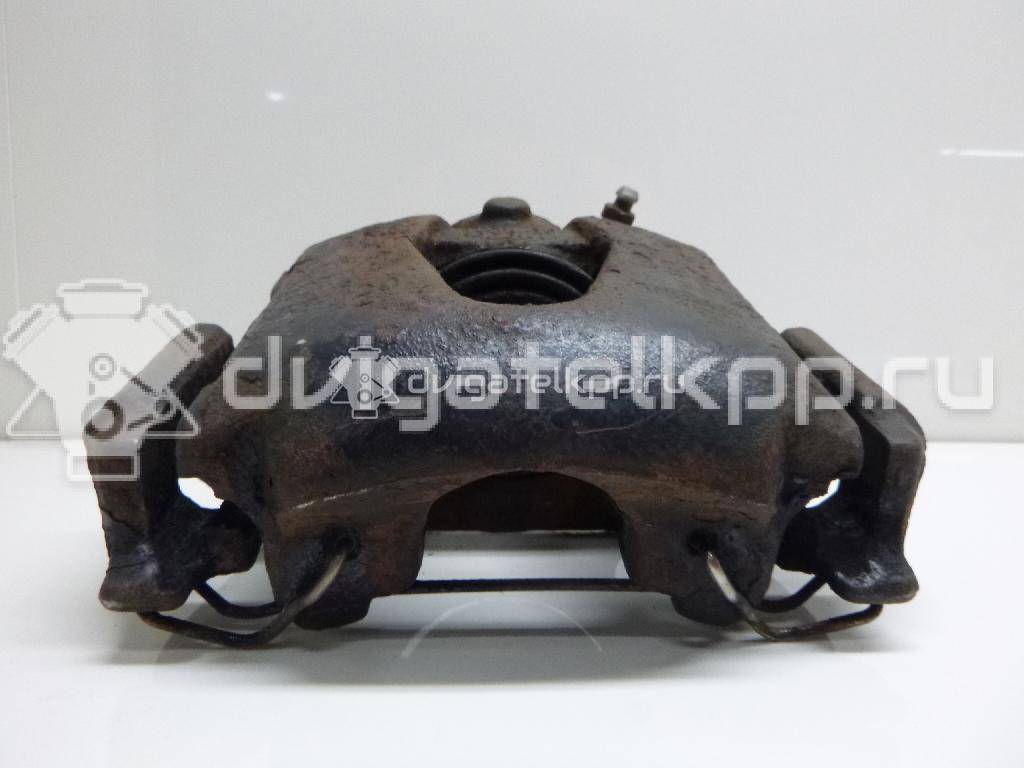 Фото Суппорт тормозной передний левый  90421739 для Opel Tigra / Campo Tf / Astra / Kadett / Corsa {forloop.counter}}