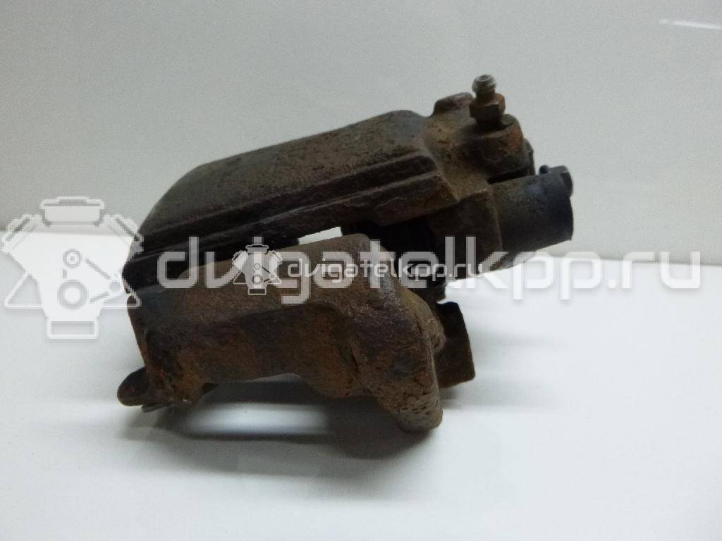 Фото Суппорт тормозной передний левый  90421739 для Opel Tigra / Campo Tf / Astra / Kadett / Corsa {forloop.counter}}