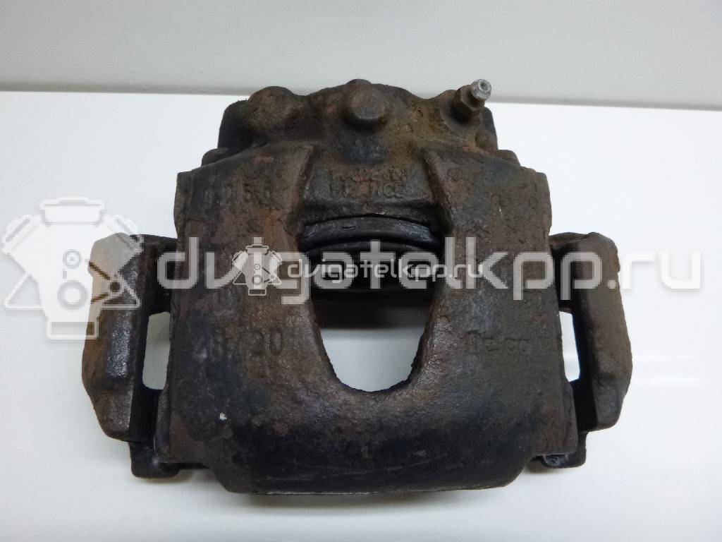 Фото Суппорт тормозной передний левый  90421739 для Opel Tigra / Campo Tf / Astra / Kadett / Corsa {forloop.counter}}