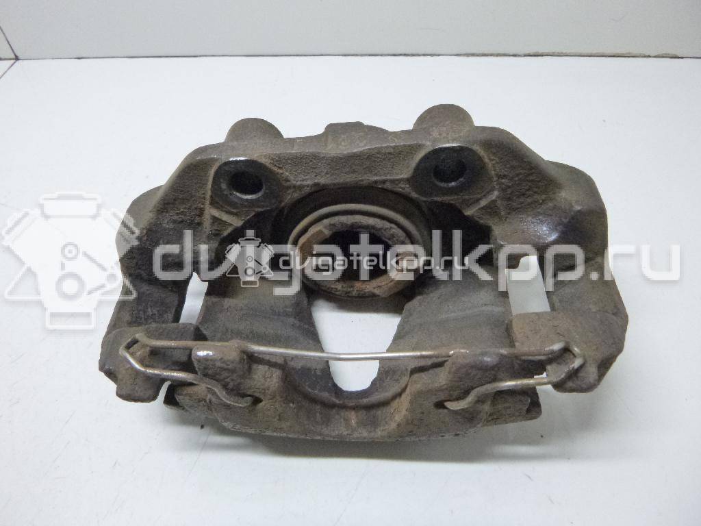 Фото Суппорт тормозной передний правый  90487043 для Opel Calibra A 85 / Astra / Kadett / Vectra / Ascona , {forloop.counter}}