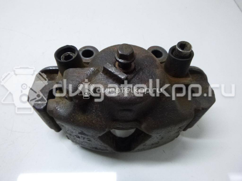 Фото Суппорт тормозной передний правый  90487043 для Opel Calibra A 85 / Astra / Kadett / Vectra / Ascona , {forloop.counter}}